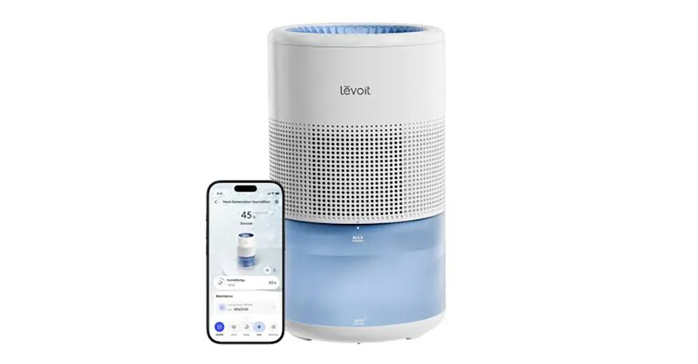 Levoit Superior Studio Smart humidifier beside the VeSync phone app